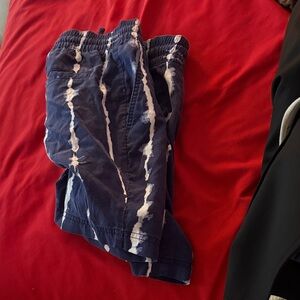 Blue and White Tie-Dye Shorts. Navy like skulls style print striped